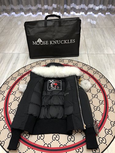 Moose Knuckles Black Down Parka with White Fur Hood and Pompom Zipper Pulls