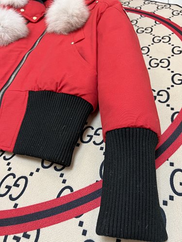 Moose Knuckles Red Down Parka with White Fur Hood and Pompom Zipper Pulls