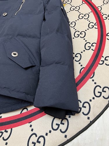 Moose Knuckles Navy Down Parka with White Fur-Trimmed Hood and Silver Hardware