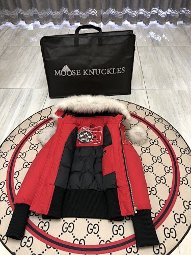 Moose Knuckles Red Down Parka with White Fur Hood and Pompom Zipper Pulls