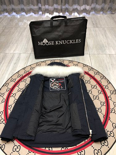 Moose Knuckles Navy Down Parka with White Fur-Trimmed Hood and Silver Hardware