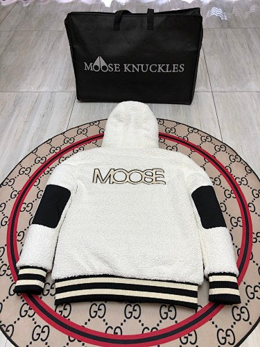 Moose Knuckles Black Down Puffer Jacket with White Sherpa Hood and Nautical Emblem Patch