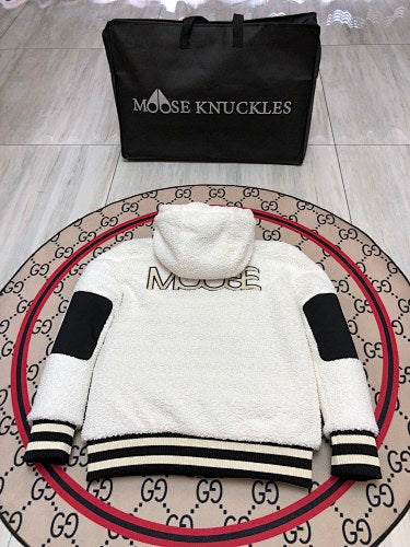 Moose Knuckles Black Down Puffer Jacket with White Sherpa Hood and Nautical Emblem Patch