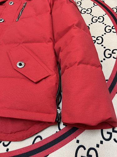 Moose Knuckles Red Down Parka with White Fur-Trimmed Hood and Gold Hardware