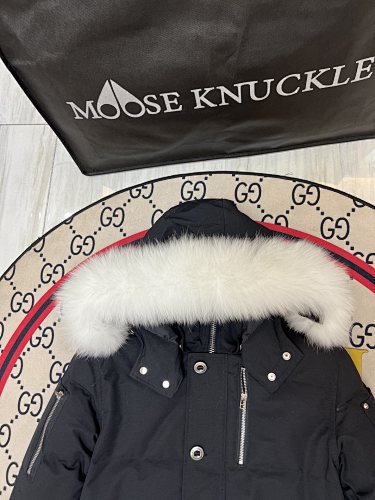 Moose Knuckles Black Down Parka with White Fur-Trimmed Hood and Silver Hardware