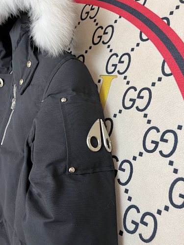 Moose Knuckles Black Down Parka with White Fur-Trimmed Hood and Silver Hardware