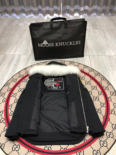 Moose Knuckles Black Down Parka with White Fur-Trimmed Hood and Silver Hardware