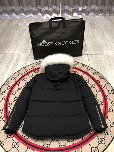 Moose Knuckles Black Down Parka with White Fur-Trimmed Hood and Silver Hardware