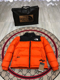 The North Face Orange Nuptse 700-Fill Down Jacket with Black Contrast Yoke