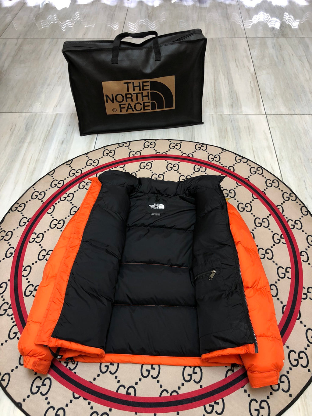 The North Face Orange Nuptse 700-Fill Down Jacket with Black Contrast Yoke