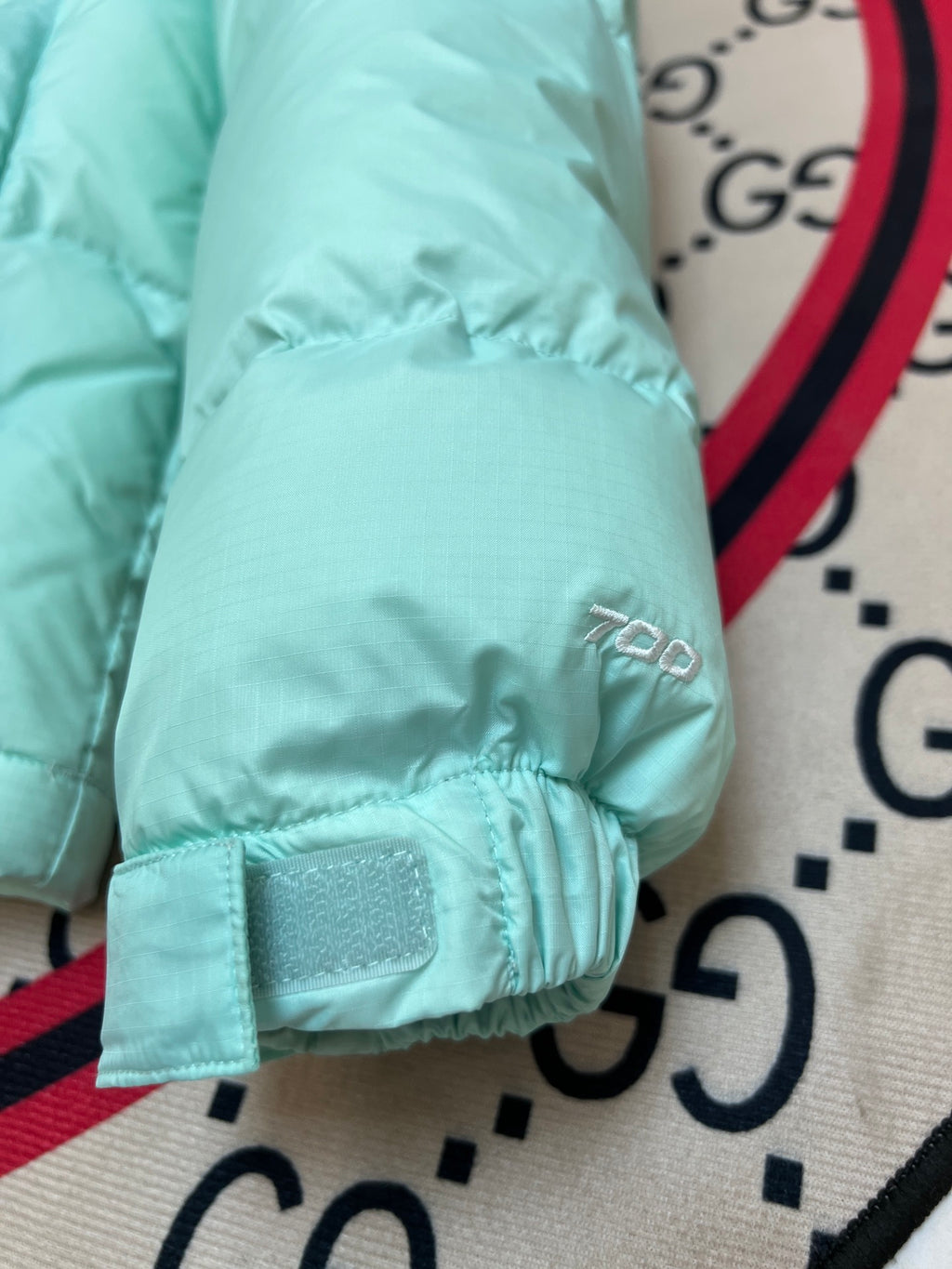 The North Face Mint Nuptse 700-Fill Down Jacket with Black Contrast Yoke